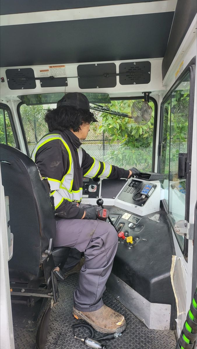 Technician servicing a truck